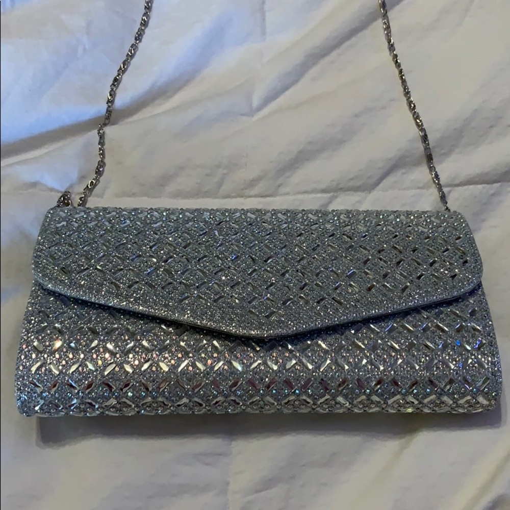 Silver evening clutch bag with chain. Brand new!